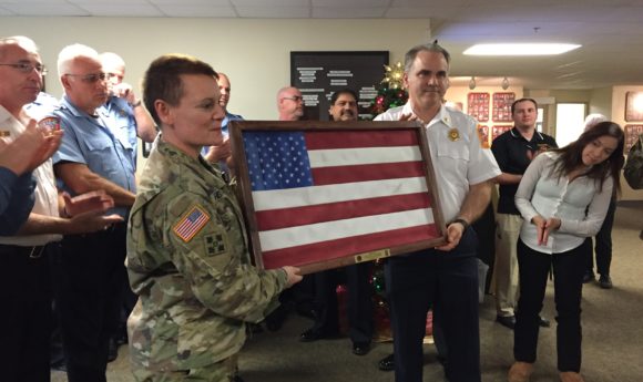 Chairmen Joseph O’Grady presenting a gift to the Commanding Officer of Fort Bragg